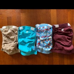 Bundle of 4 size small g diapers. Lightly used